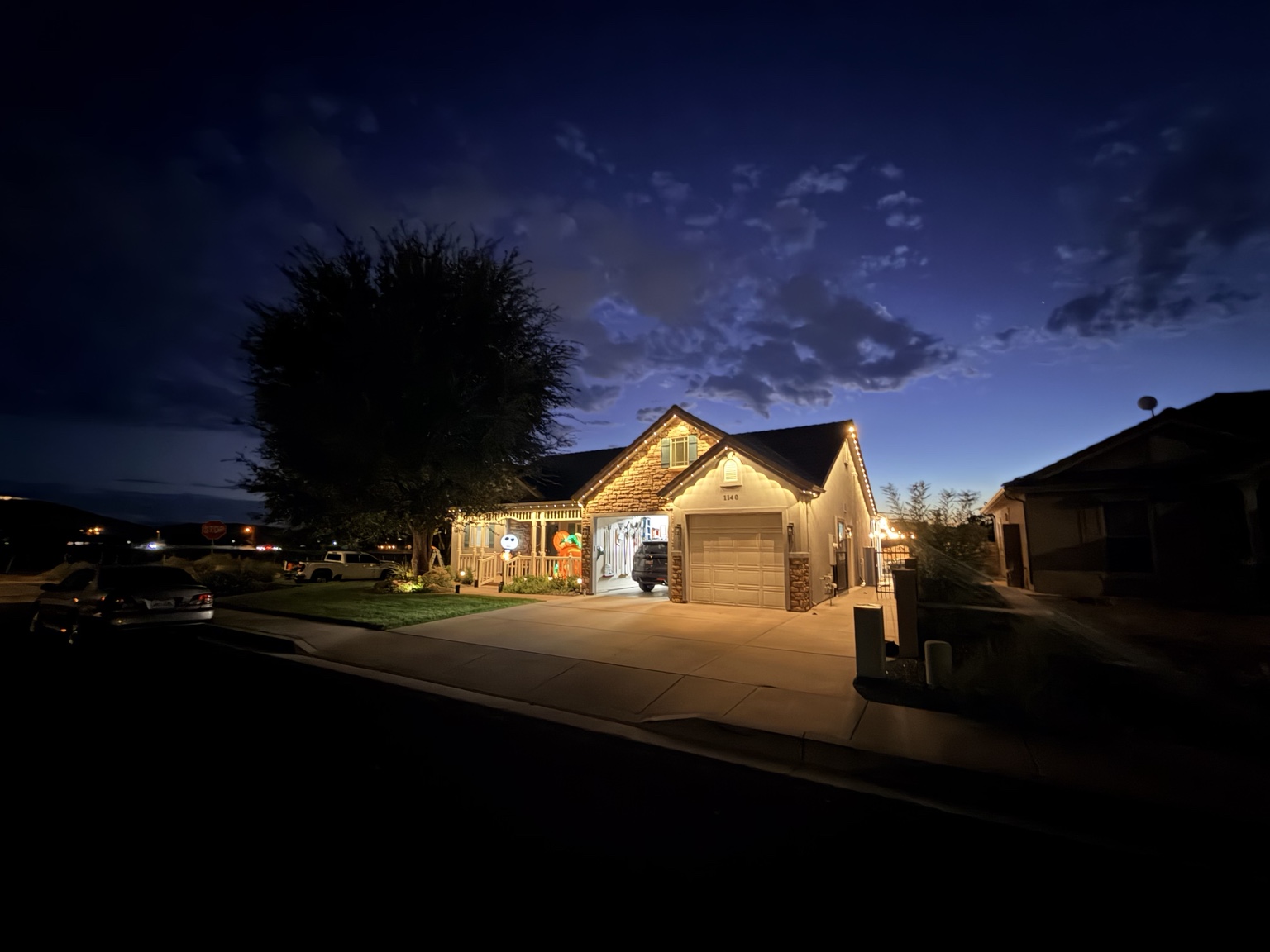 Warm white permanent eave lighting on a completed home